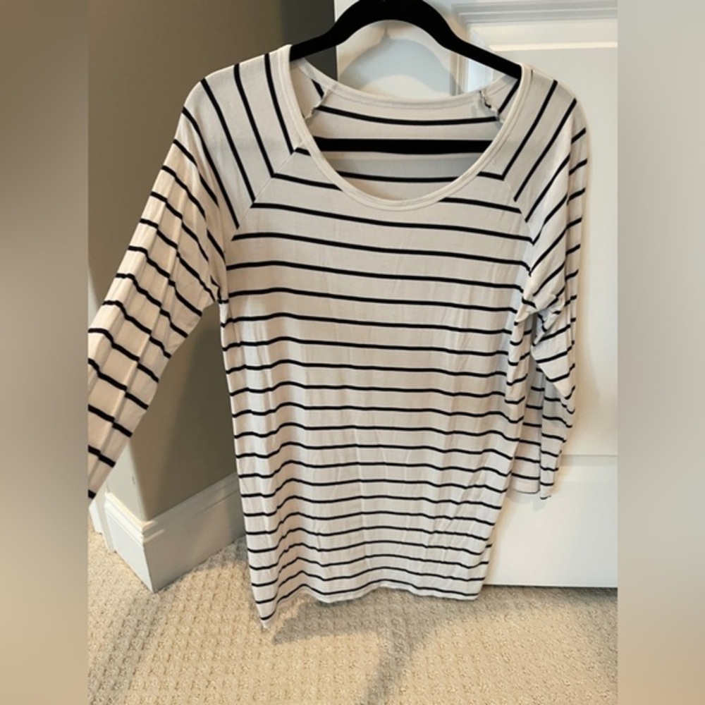 Long sleeve tee shirt white with blue stripes size medium.